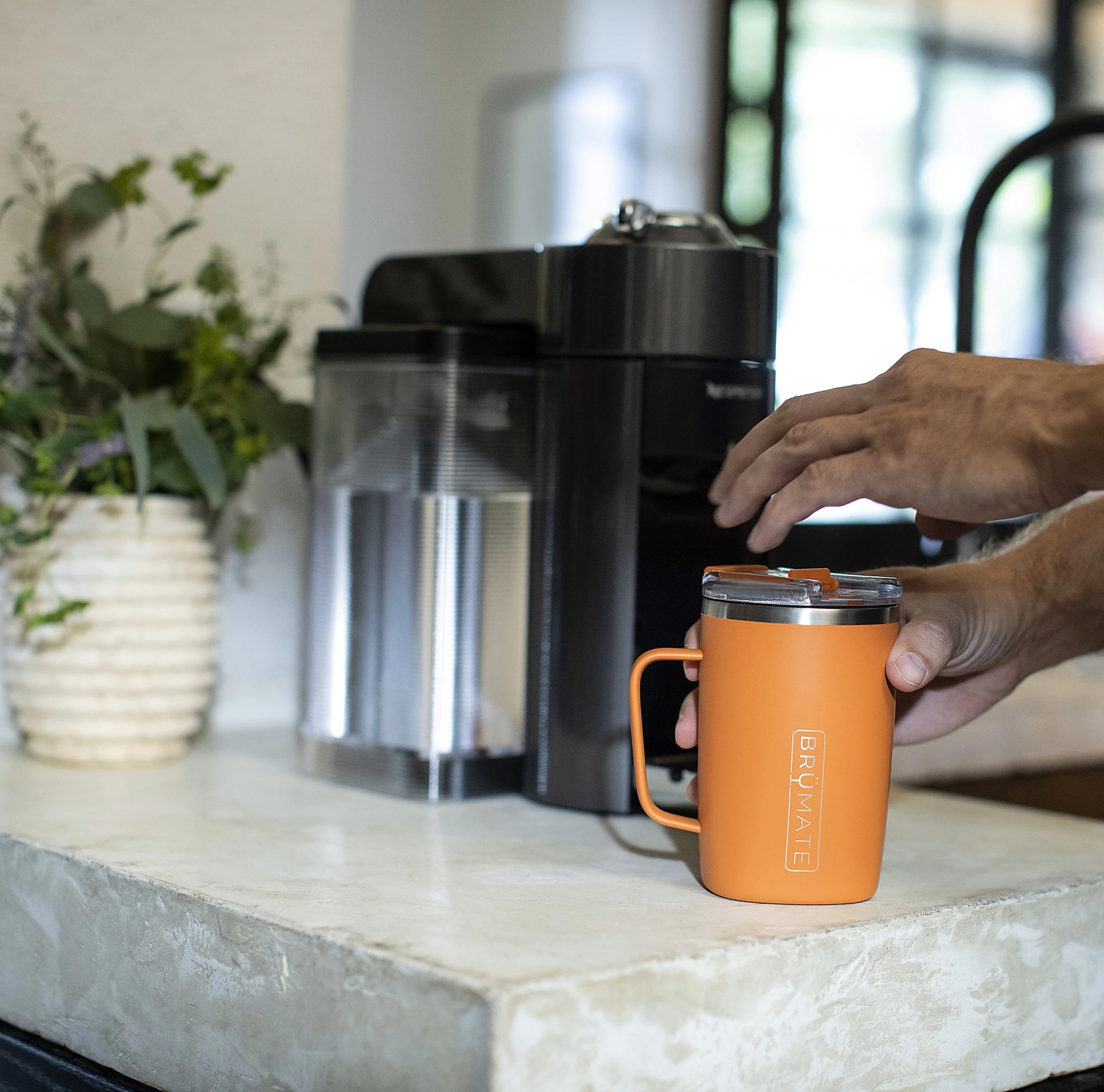 appliance and cup on counter
