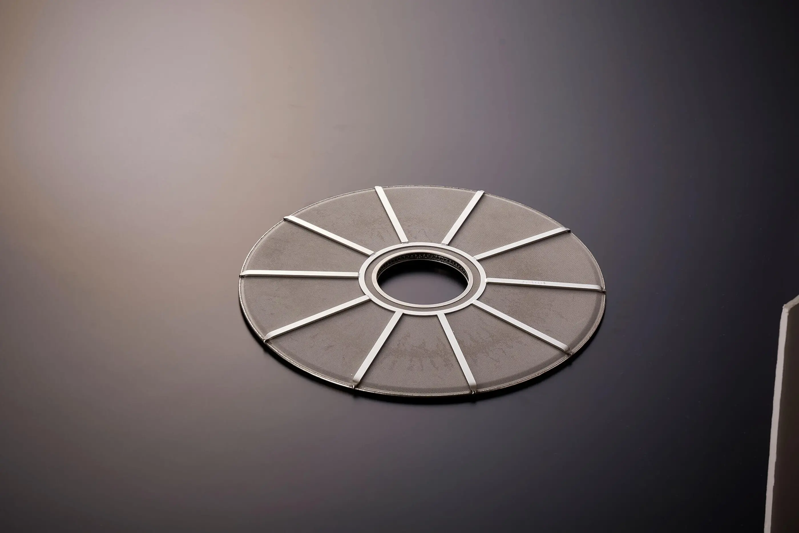 single denafilter on dark grey background