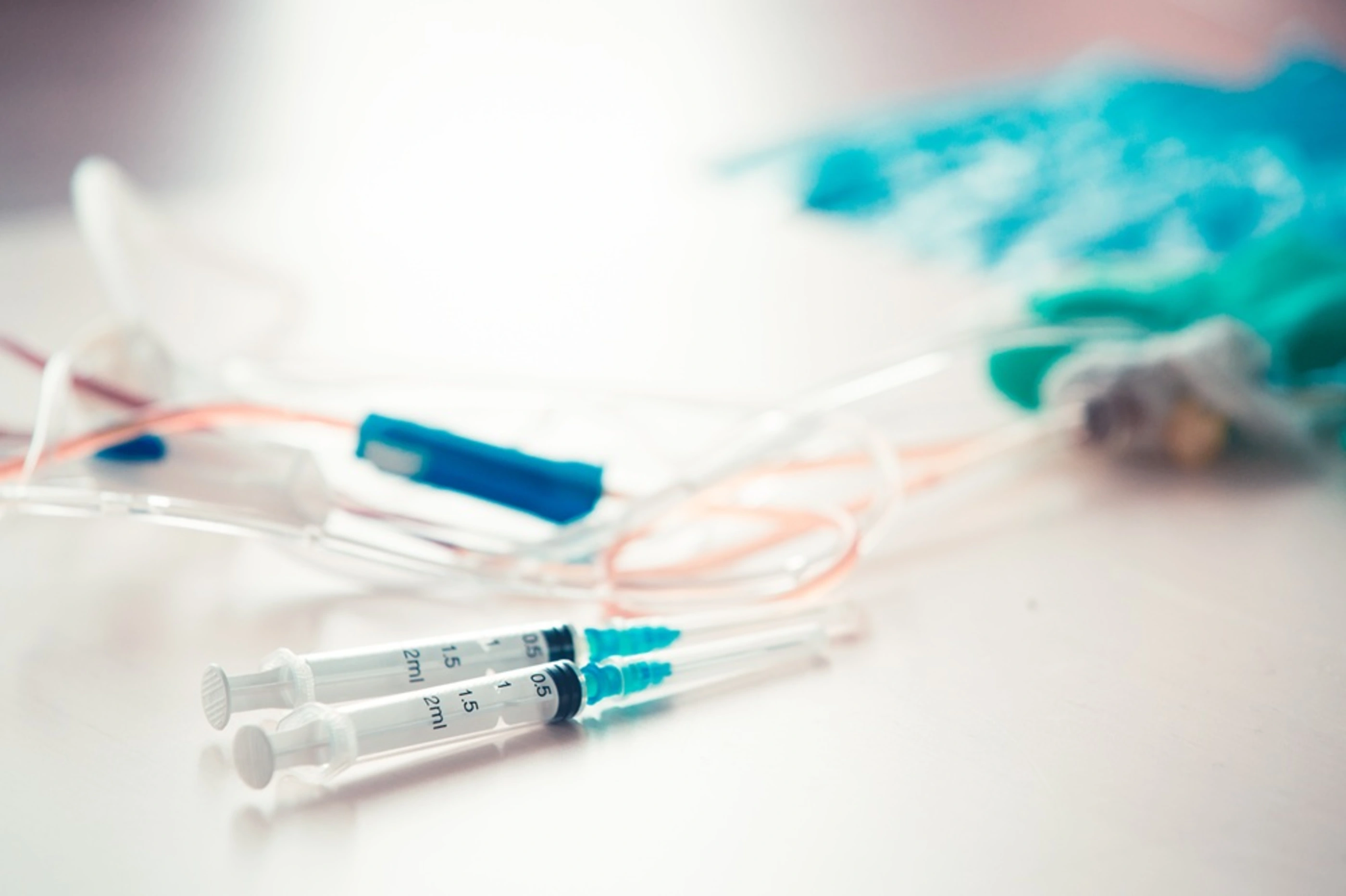 Medical background with  syringe and vaccine bottles