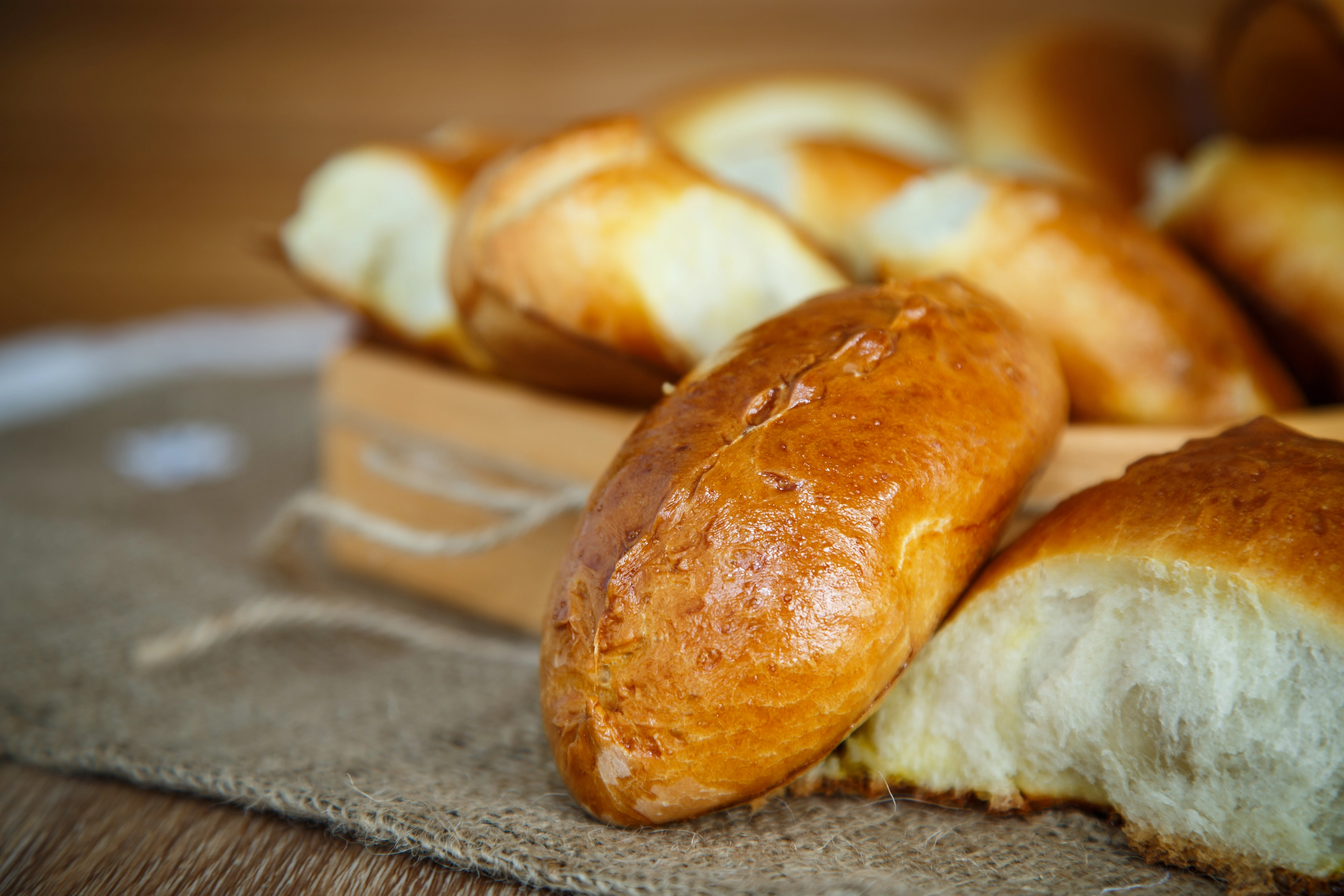 pastry stuffed in a wooden bowl on a table