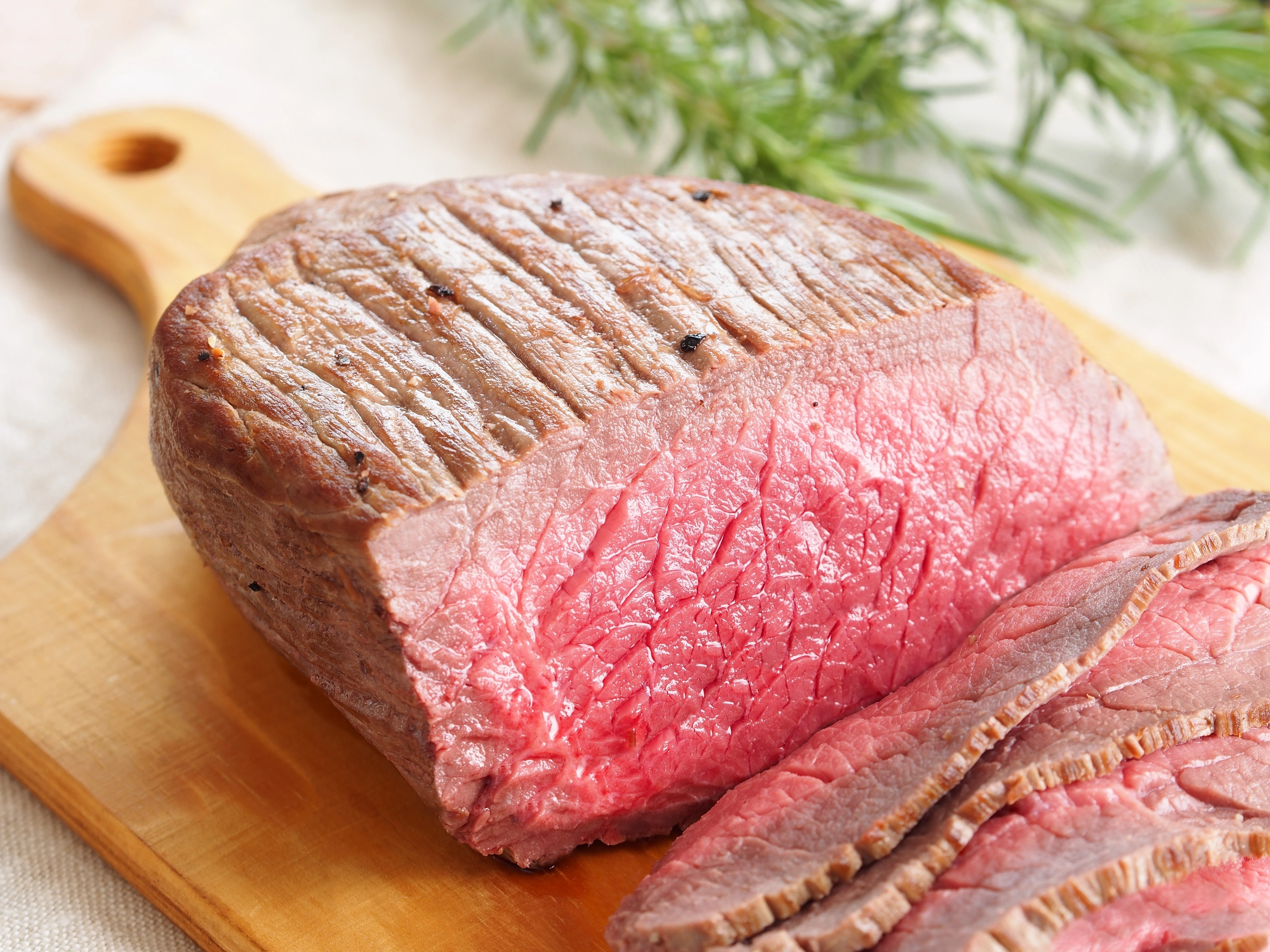 Roast beef on a wooden board
