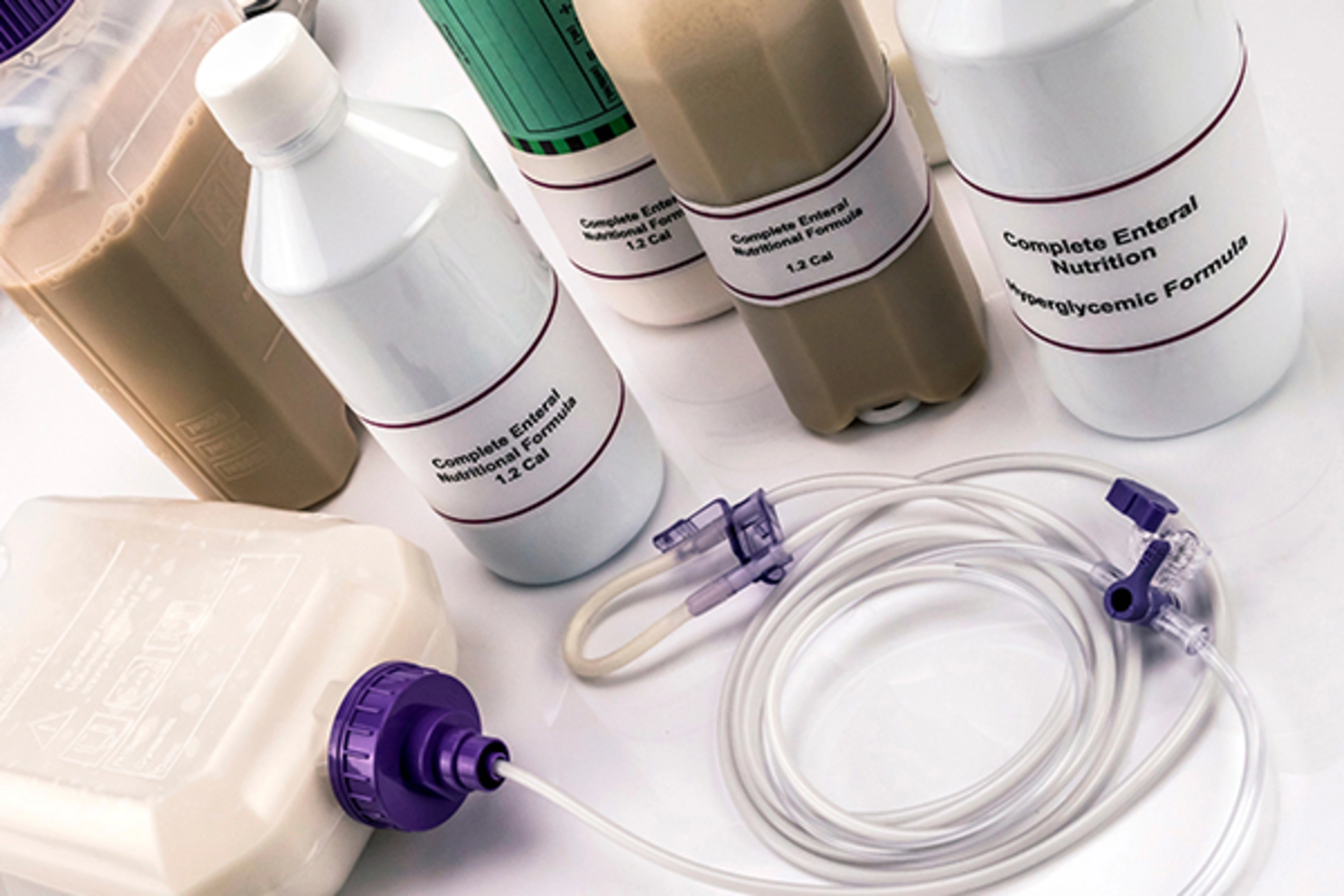 Team of enteral nutrition prepared in hospital, palliative care, conceptual image, vertical composition 