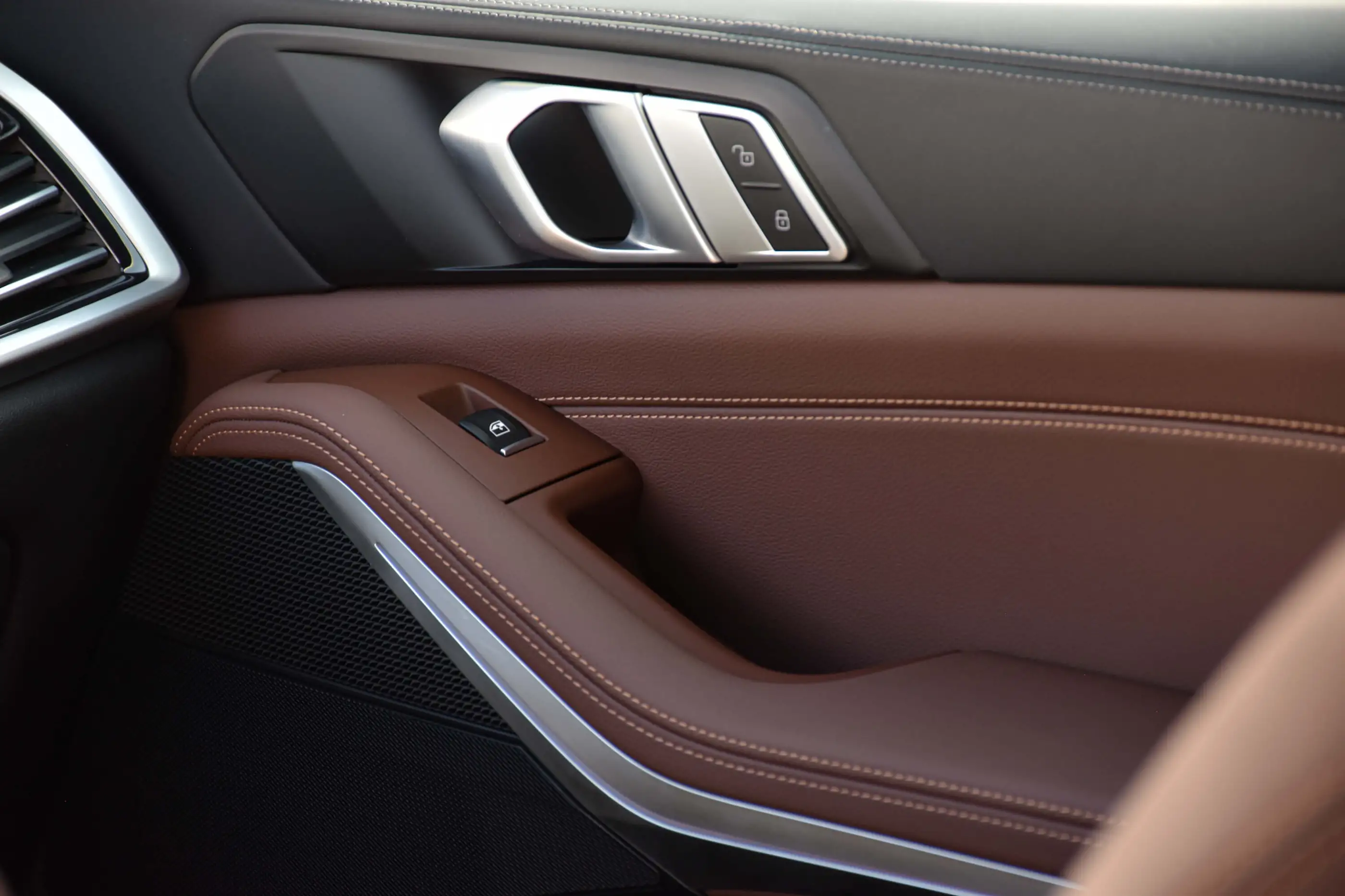 tan leather molded interior door panel