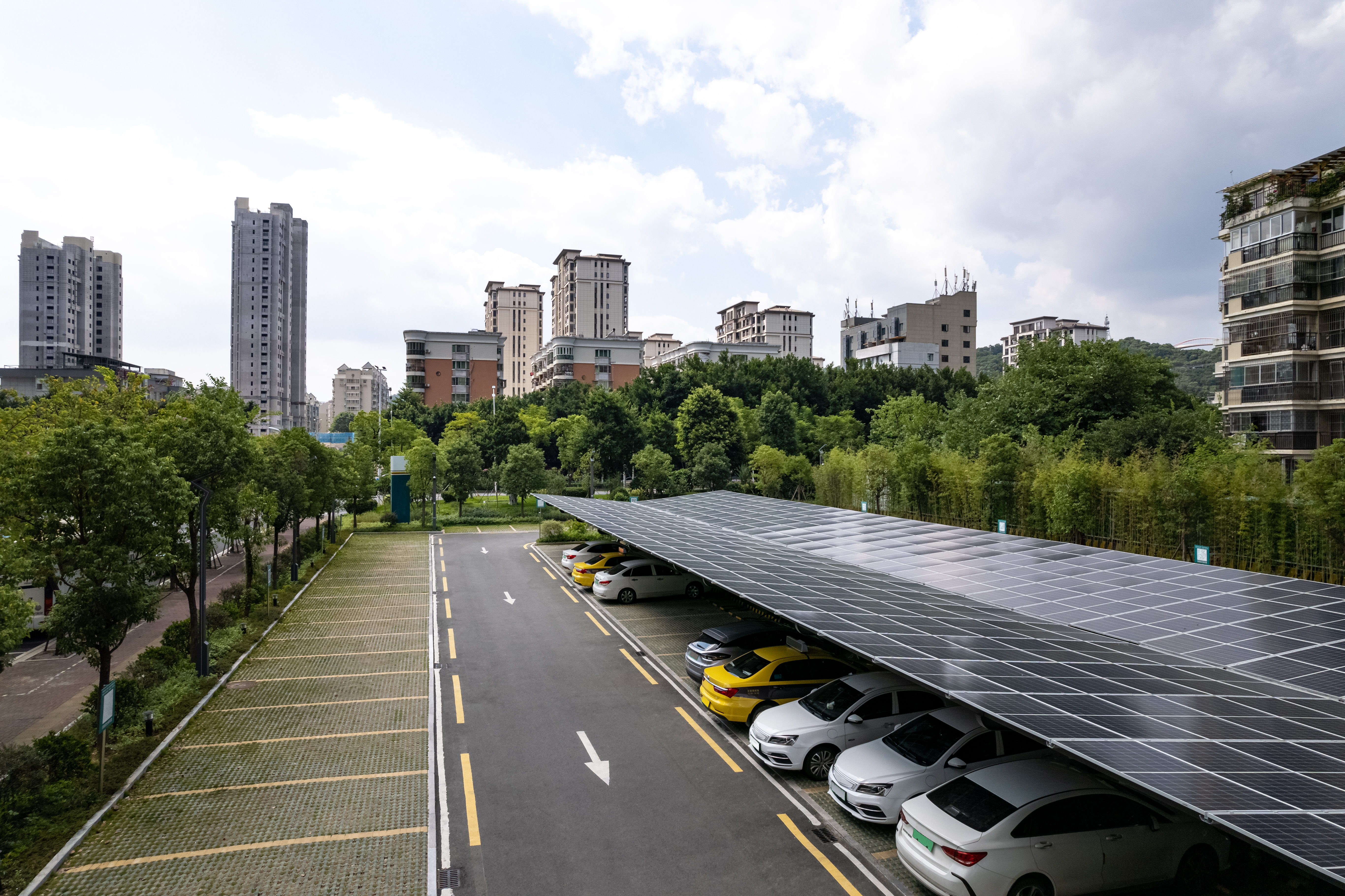 Urban parking lot with solar panels on the roof